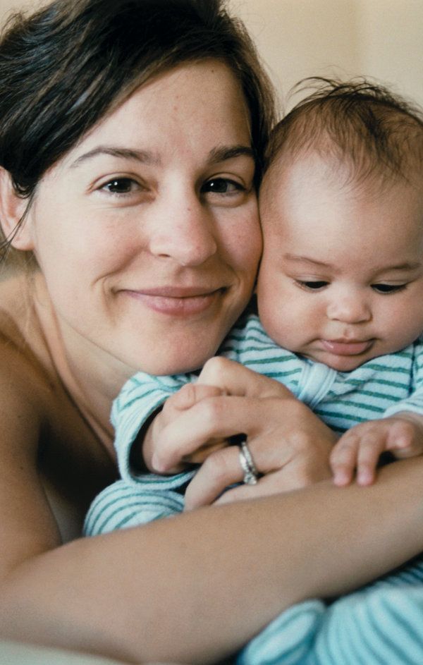 Mother holding cute baby 