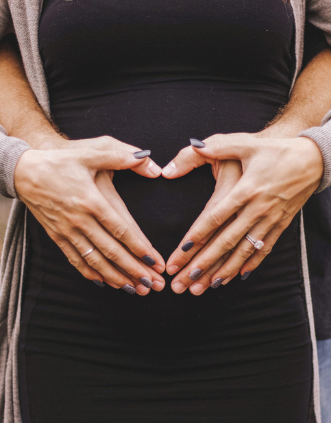 Man hugging his pregnant wife